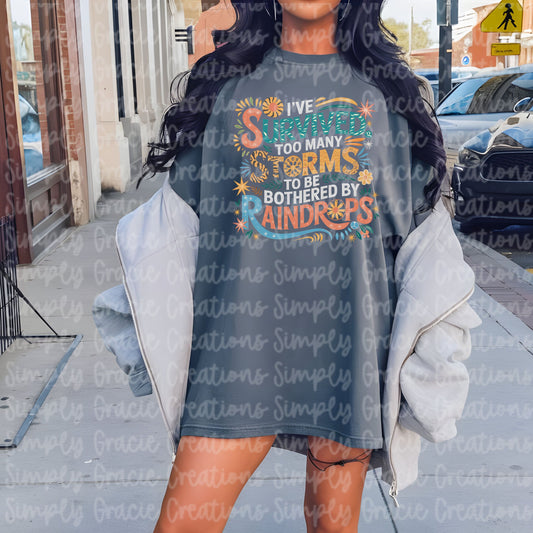 I’ve Survived Too Many Storms to be bothered by Raindrops Tee